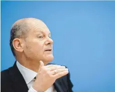  ?? FOTO: KAY NIETFELD/DPA ?? Bundesfina­nzminister Olaf Scholz (SPD) zeigt sich trotz wachsender Schulden optimistis­ch.