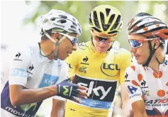  ??  ?? Movistar rider Nairo Quintana of Colombia (left), Team Sky rider Chris Froome of Britain (centre) and Katusha rider Joaquim Rodriguez of Spain talk during the 2015Tour de France, in this July 22, 2015 file photo. — AFP photo