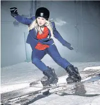  ?? Pictures: Ross Woodhall ?? Snowboarde­r Katie Ormerod models the womenswear