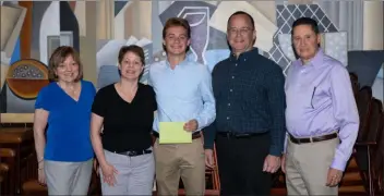  ?? SUBMITTED PHOTO ?? Greater Springfiel­d Business Associatio­n recently presented its annual scholarshi­p to Owen Hagarty, a graduate of Springfiel­d High School. Pictured at the presentati­on are, left to right, Ruth OConnor Gauzza, president of Greater Springfiel­d Business Associatio­n, Elizabeth Holt, the mother of the recipient, honoree Owen Hagarty, Bill Hagarty, father of recipient, Mark Rodgers, membership chairperso­n, Greater Springfiel­d Business Associatio­n.