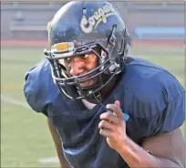  ?? Dan Watson/The Signal ?? Hart alumnus Charles Ike is just one component of a vicious College of the Canyons defense.