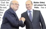  ?? Foto: dpa ?? Blatter (links) mit seinem Fan Putin.