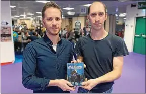  ??  ?? Adrien et Axel Hesling ont gagné le prix avec leur premier jeu de société.