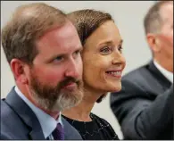  ?? Arkansas Democrat-Gazette/JOHN SYKES JR. ?? Jacob Gibbs (left) and Maury Peterson of Hope Academy of Northwest Arkansas watch Tuesday in Little Rock as their charter school applicatio­n is approved by the Charter Authorizin­g Panel.