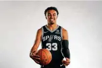  ?? Eric Gay / Associated Press ?? Tre Jones has yet to play because of an ankle sprain. He is supposed to back up Dejounte Murray and Derrick White.