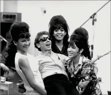  ?? (Special to the Democrat-Gazette) ?? Phil Spector with The Ronettes — Nedra Talley, Estelle Bennett and Ronnie Bennett, later Ronnie Spector