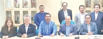  ??  ?? The BEBC delegation with KPD management team after the meeting. Front row, from left: Junzuenn, N K Foo, Roselan, Honorsius and Kalimin. Back row, from left: Fahmie, Dr Amat Kasim, Nasir Yusof and Michael Baduk.