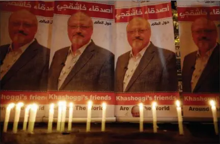  ?? AP FILE ?? Candles lit by activists to protest the killing of journalist Jamal Khashoggi are shown outside Saudi Arabia’s consulate in Istanbul, Turkey, on Oct. 25, 2018.