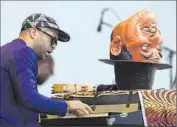  ??  ?? JASON MORAN, with his Fats Waller mask resting on his piano, salutes the legend at festival Saturday.