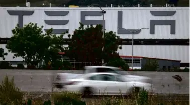  ?? DAVID PAUL MORRIS/BLOOMBERG ?? Tesla’s assembly plant in Fremont, Calif. Many of Tesla’s employees are based there and at three other large car factories in Austin, Texas; Shanghai, and near Berlin.