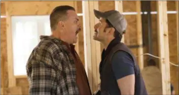  ?? FOX SEARCHLIGH­T ?? Farva (Kevin Heffernan, left) and Mac (Steve Lemme) argue in an early scene from “Super Troopers 2.”