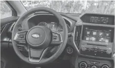  ??  ?? The new Crosstrek features some styling upgrades in the cabin.