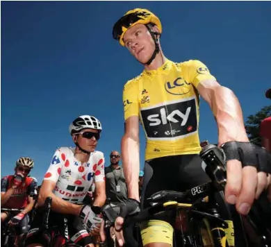  ?? FOTO: BENOIT TESSIER ?? Den gule trøya i Tour de France er forbundet med mange uskrevne regler. Her er det Chris Froome som soler seg i glansen.