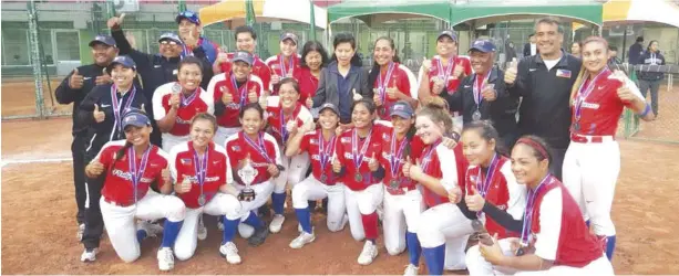  ?? PHOTO COURTESY OF ASAPHIL ?? Philippine Blu Girls players don the silver medals they won after their final match against Japan in the 11th Asian Softball Championsh­ips in Taichung City, Taiwan.