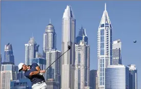  ?? KAMRAN JEBREILI / AP ?? Rory Mcilroy shot 6-under 66 at the Dubai Desert Classic on Friday.