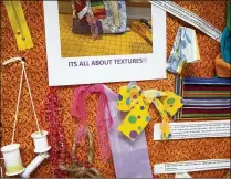  ??  ?? A bulletin board at the Sand Dollars Quilting Bee shows some of the household materials used in making “fidget” pillows.