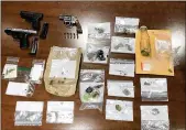  ?? BARTOWCART­ERSVILLE DRUG TASK FORCE ?? Police found guns and drugs inside a Bartow County home during a weekend party.