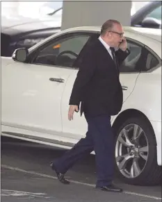  ?? H John Voorhees III / Hearst Connecticu­t Media ?? Bruno DiFabio, of Ridgeield, a celebrity chef and TV personalit­y, leaves his attorney’s Southport office after being sentenced to 30 days in prison on a federal tax evasion charge during a virtual hearing on Thursday.