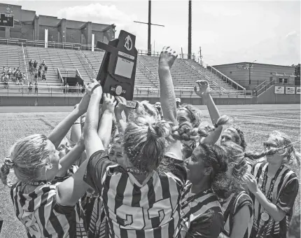  ?? NATHAN J FISH/THE OKLAHOMAN ?? Heritage Hall celebrates after defeating Victory Christian in the Class 3A girls soccer championsh­ip Friday at Taft Stadium.