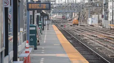  ?? H John Voorhees III/Hearst Connecticu­t Media file photo ?? Trains arrive and depart the Metro-North station in South Norwalk. If approved, proposed train schedules could begin taking effect later this month, with fare increases rolling out on Nov. 1.