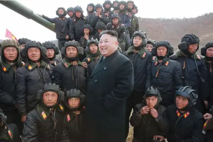  ??  ?? KIM JONG UN attends the Korean People’s Army Tank Crews’ Competitio­n in in Pyongyang, North Korea.
