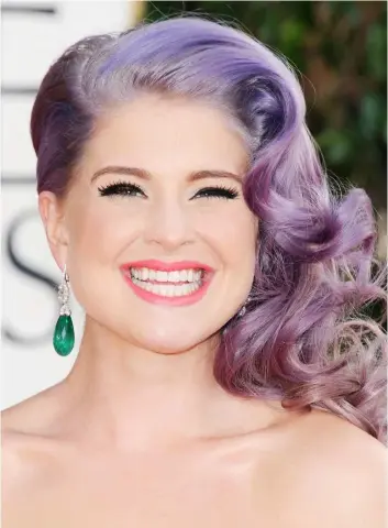  ?? JORDAN STRAUSS/INVISION/AP ?? TV personalit­y Kelly Osbourne arrives at the 70th Annual Golden Globe Awards at the Beverly Hilton Hotel in Beverly Hills, Calif.