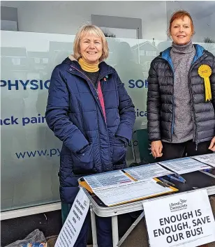  ?? ?? Trudi Cotton with Cllr Tim Dumper and Dianne Conduit and the bus petition after Stagecoach made changes to services on some of its routes