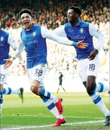  ??  ?? EARLY HOPE: Sheffield Wednesday’s Sean Clare enjoys scoring their first goal