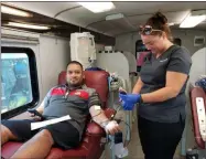  ?? SUBMITTED PHOTO ?? Jose Guzman, 35, of Grafton, donates double red cells Aug. 20 at the Lorain County Fair.