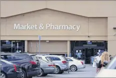 ?? Will Waldron / times union ?? Big box stores such as the Glenmont Walmart in Bethlehem have had to transition from sellers to public health stewards.