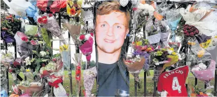  ?? ANDREW JAMES ?? Some of the tributes left at Splott Park, Muirton Road, Cardiff, after the death of Jacob Abraham