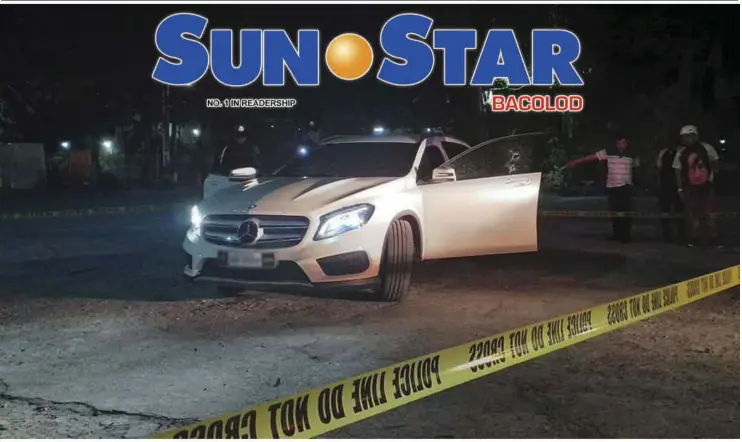  ?? CONTRIBUTE­D PHOTO ?? POLICE cordoned the area, where a Filipino-chinese businessma­n and his wife on board a white Mercedes Benz were shot by unidentifi­ed motorcycle-assailants inside the compound of Redemptori­st Church at Barangay 5 in Bacolod City Tuesday night.