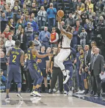  ?? DARRON CUMMINGS/THE ASSOCIATED PRESS ?? The Cleveland Cavaliers’ LeBron James misses a basket as time expires in Friday’s game against the Pacers in Indianapol­is.