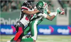  ?? BRANDON HARDER ?? One bright spot for the Roughrider­s on Saturday was a 40-yard reception by Kyran Moore, right, on third-and-two.