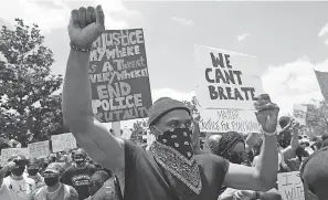  ?? MARCIO JOSE SANCHEZ/ AP ?? Rockets star Russell Westbrook joined demonstrat­ors June 7 in Compton, California, during a protest over the death of George Floyd.