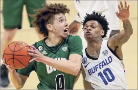  ?? Tony Dejak / Associated Press ?? Ohio's Jason Preston, left, took off during his sophomore season, leading the team in virtually all offensive categories.