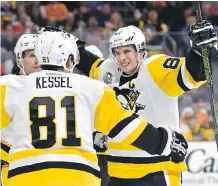  ?? DERIK HAMILTON/THE ASSOCIATED PRESS/FILES ?? Pittsburgh Penguins captain Sidney Crosby and other stars have said they want to go to the 2018 Winter Olympics, but haven’t said they’d leave their NHL teams to do so.