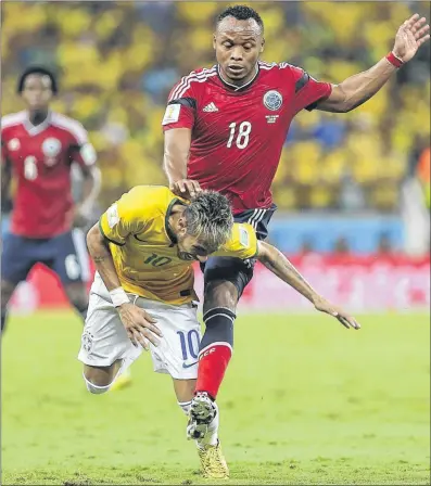  ?? Picture: EPA ?? CLOSE ENCOUNTER: Neymar was carried off on a stretcher following a foul by Colombia’s Juan Zuniga.