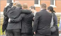  ??  ?? Friends and family arrive at church in upstate Amsterdam on Saturday for funeral for eight of the 20 victims of horrific limousine crash a week ago. Left, urn with ashes of Adam and Abigail Jackson.