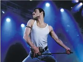  ??  ?? Rami Malek portrays rock icon Freddie Mercury in Bohemian Rhapsody.