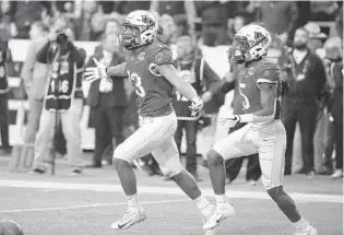  ?? STEPHEN M. DOWELL/ORLANDO SENTINEL ?? after a touchdown catch during the Fiesta Bowl.