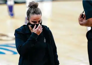  ?? Eric Gay / Associated Press ?? Assistant Becky Hammon has been in COVID-19 protocol in Los Angeles with Drew Eubanks and an unnamed staffer. “We’ve been in contact with Becky,” coach Gregg Popovich said.