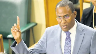  ??  ?? Minister of Finance and the Public Service, Dr Nigel Clarke, opening the Budget Debate at Gordon House on Tuesday, March 10.