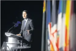  ?? CP PHOTO ?? Prime Minister Justin Trudeau speaks as the 2017 Symons Lecturer at the Confederat­ion Centre of the Arts in Charlottet­own, P.E.I., on Thursday.