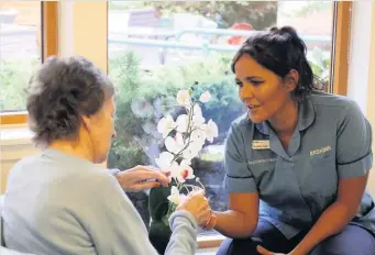  ??  ?? Gold standards
Erskine resident Isa Carlin with nurse Heather Fyfe