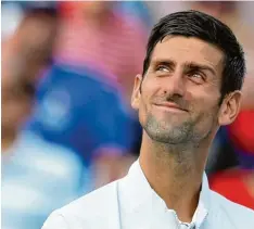  ?? Foto: Rob Carr, afp ?? Novak Djokovic freut sich in Cincinnati. Er ist nun der erste Profi, dem es gelang, die neun Turniere der Masters 1000 Serie zu gewinnen.