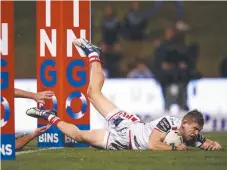  ?? Picture: GETTY IMAGES ?? Matt Dufty scores the Dragons’ winning try.