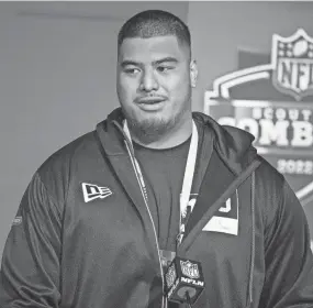  ?? TREVOR RUSZKOWSKI/USA TODAY SPORTS ?? Daniel Faalele, at 6-foot-8, 385 pounds, starred at Minnesota is expected to soon become the NFL’S largest player.