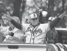  ?? AP ?? Atlanta Braves manager Brian Snitker celebrates the team's World Series championsh­ip during a victory parade on Friday in Atlanta. The Braves beat the Houston Astros to win their first World Series title in 26 years.