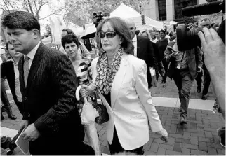 ?? WIN MCNAMEE/GETTY IMAGES ?? Kathleen Manafort leaves an Alexandria, Va., courthouse after a jury found her husband guilty on eight counts of fraud, a verdict seen as a victory in special counsel Robert Mueller’s wide-ranging investigat­ion.